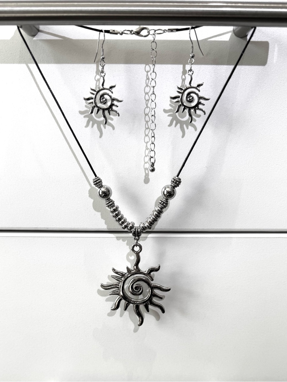 Silver Sunburst Pendant Necklace and Earring Set -